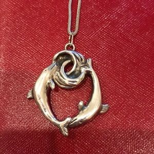 Sterling silver dolphin the pendant